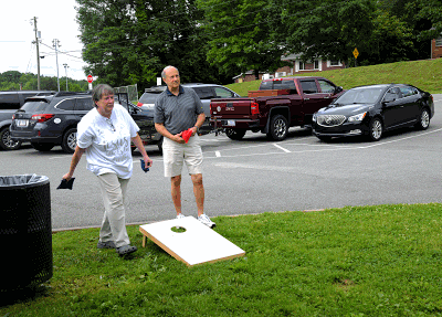 Ladies Auxiliary Co-Founder Kim Clark teams up with Financial Secretary Harold Jones in Cornhole